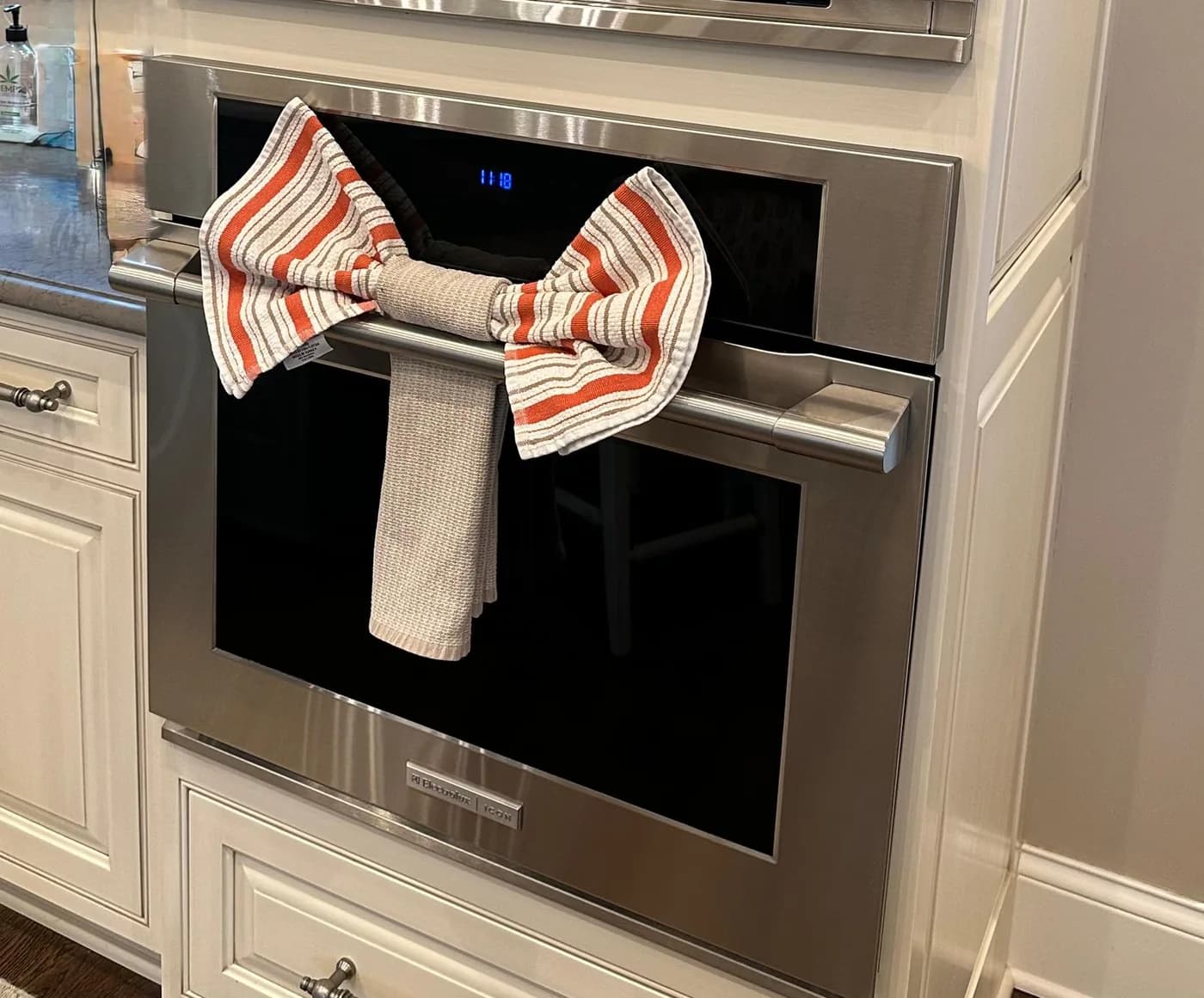 Kitchen cleaned with the oven towel tied into a bow by Dolane Cleaning Services