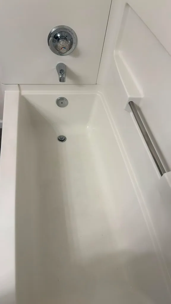 Bathtub scrubbed clean by Dolane Cleaning Services