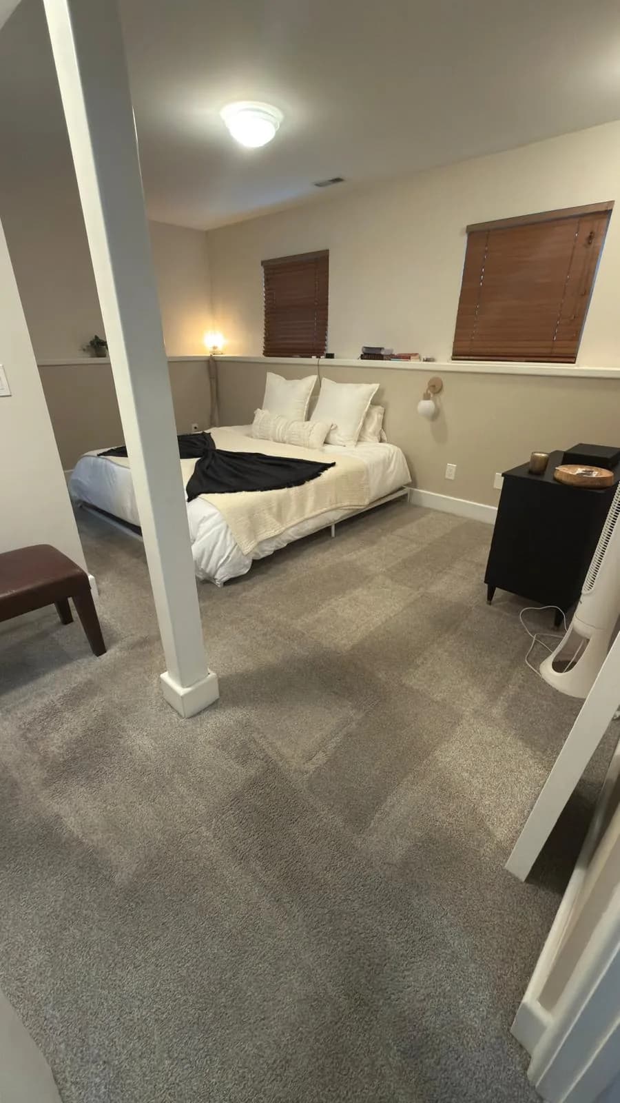 Lower-level bedroom cleaned and carpet vacuumed by Dolane Cleaning Services