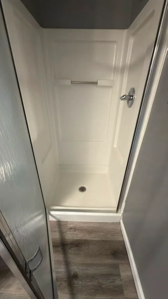 Shower enclosure cleaned and left spotless by Dolane Cleaning Services