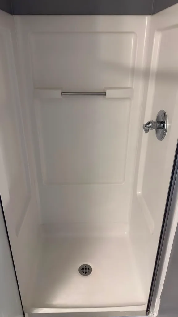 Shower stall left clean and dry by Dolane Cleaning Services